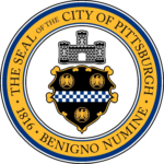 The Seal of the City of Pittsburgh, founded in 1816. A Latin inscription says Benigno Numine.